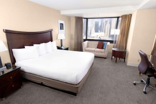 Habitación Doble Deluxe en esquina con cama grande del hotel Parc 55 San Francisco - A Hilton. Foto 1