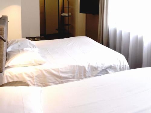 Habitación Estándar - 1 cama doble y 1 individual del hotel Ibis Lille Centre Grand Place. Foto 3