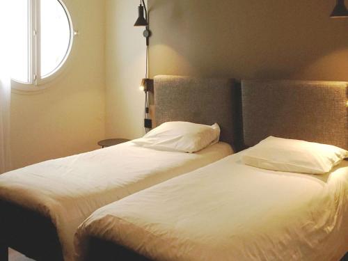 Habitación Doble Estándar - 2 camas del hotel Ibis Lille Centre Grand Place. Foto 4
