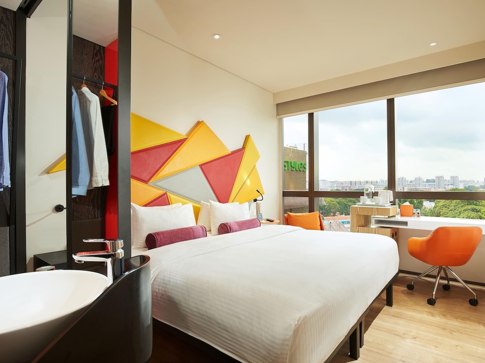 Habitación estándar Queen con vistas a la piscina del hotel Ibis Styles Singapore On Macpherson