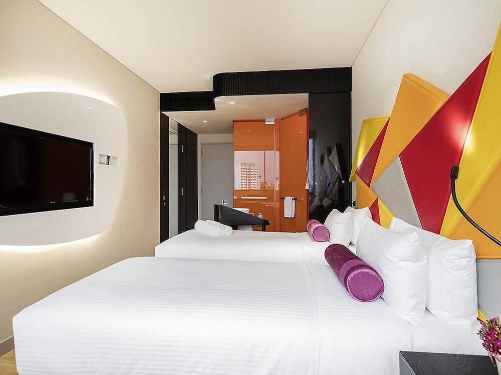 Habitación estándar triple con tres camas individuales del hotel Ibis Styles Singapore On Macpherson. Foto 4