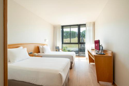 Habitación Doble Premier - 1 o 2 camas del hotel Exe Area Central. Foto 3