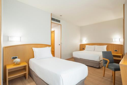 Habitación Triple del hotel Exe Area Central. Foto 5