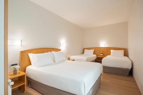 Habitación cuádruple del hotel Exe Area Central