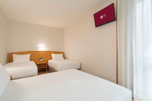 Habitación cuádruple del hotel Exe Area Central. Foto 1