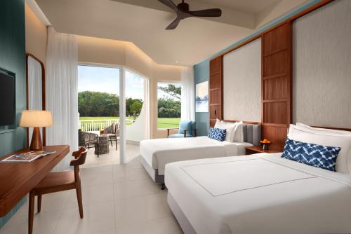 Habitación Superior con vistas al jardín - 2 camas individuales del hotel Taj Bentota Resort and Spa. Foto 1