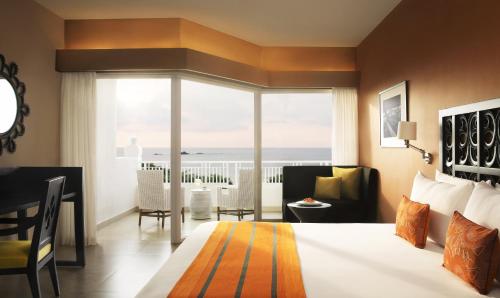 Habitación Deluxe con vistas al jardín - 2 camas del hotel Taj Bentota Resort and Spa. Foto 1
