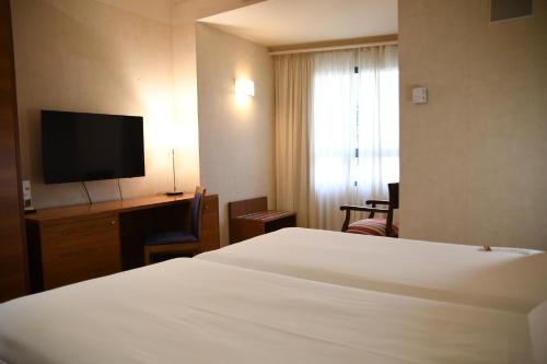 Habitación Doble (1 o 2 personas) del hotel Sercotel Palacio De Tudemir. Foto 1