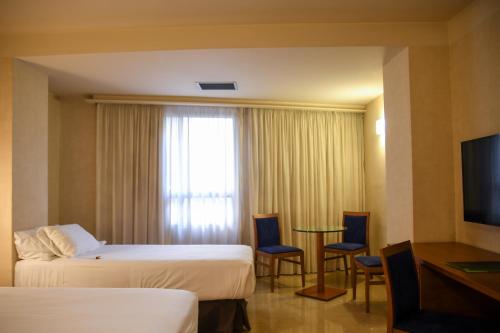 Habitación Triple del hotel Sercotel Palacio De Tudemir