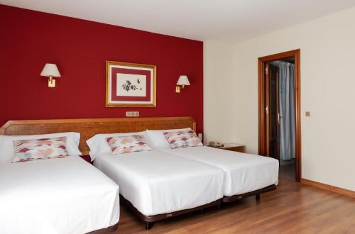 Habitación Doble con Cama supletoria del hotel Don Carmelo