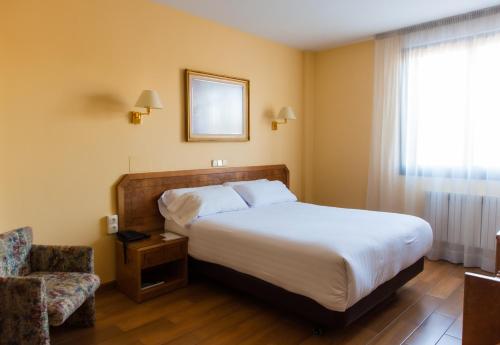 Habitación Estándar - 1 cama grande del hotel Don Carmelo. Foto 2