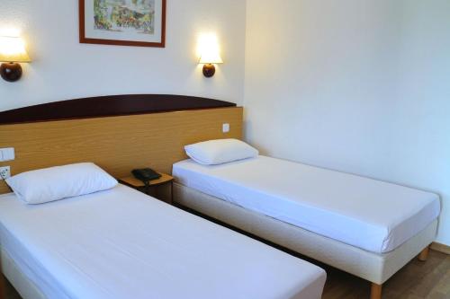 Habitación Doble - 2 camas del hotel Travelodge Barcelona del Vallés. Foto 4