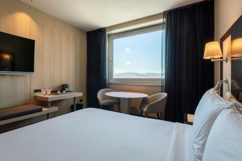 Habitación Doble Superior con vistas a la ciudad - 1 o 2 camas del hotel Leonardo Royal Barcelona Forum. Foto 1