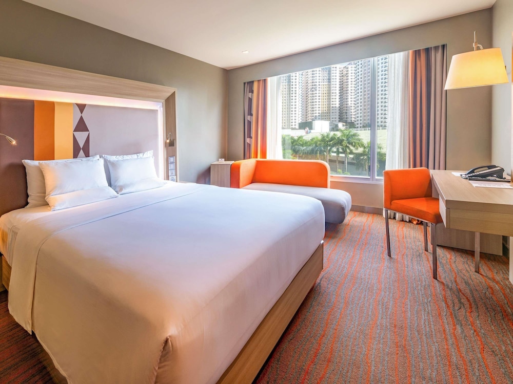 Habitación Superior con cama king del hotel Novotel Manila Araneta City
