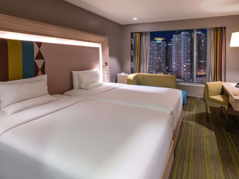 Habitación Ejecutiva con cama King del hotel Novotel Manila Araneta City