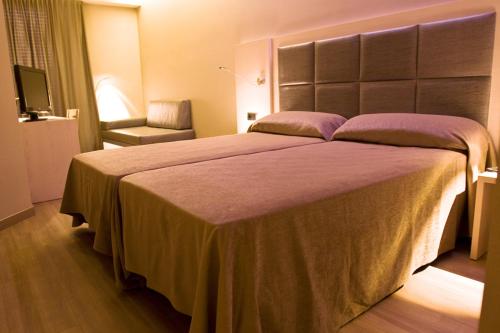 Habitación Triple del hotel Barcelona House. Foto 3