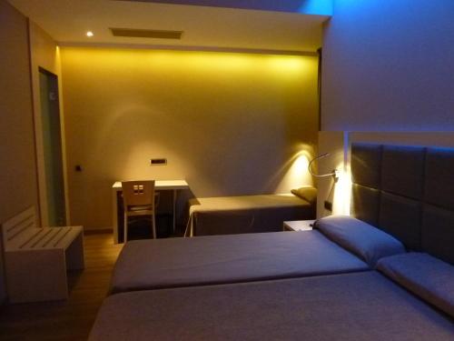 Habitación Triple del hotel Barcelona House. Foto 4