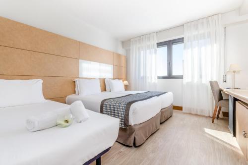 Habitación Triple del hotel Exe Campus