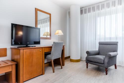 Habitación Triple del hotel Exe Campus. Foto 1