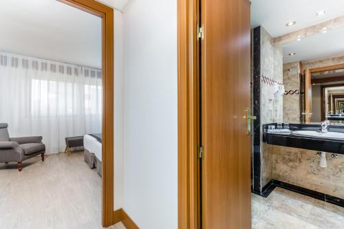 Habitación Triple del hotel Exe Campus. Foto 3