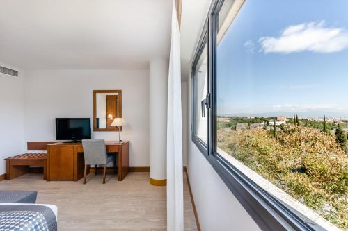 Habitación Triple del hotel Exe Campus. Foto 4