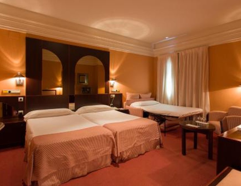 Habitación Doble con Cama supletoria del hotel Soho Boutique Jerez. Foto 9