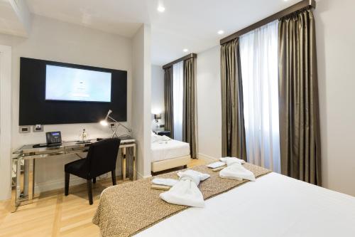 Habitación Triple Deluxe del hotel Floris
