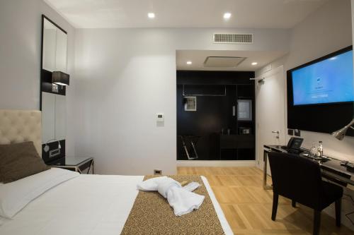 Habitación Triple Deluxe del hotel Floris. Foto 1