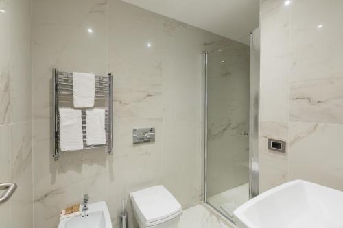 Habitación Triple Deluxe del hotel Floris. Foto 3