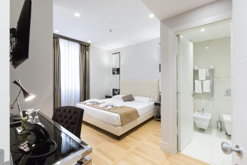 Habitación Triple Deluxe del hotel Floris. Foto 5