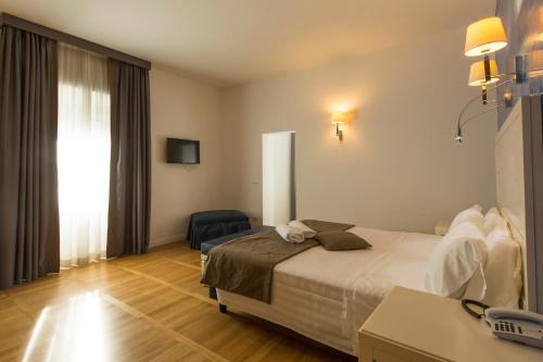 Habitación Cuádruple Deluxe del hotel Floris