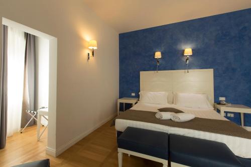 Habitación Cuádruple Deluxe del hotel Floris. Foto 2