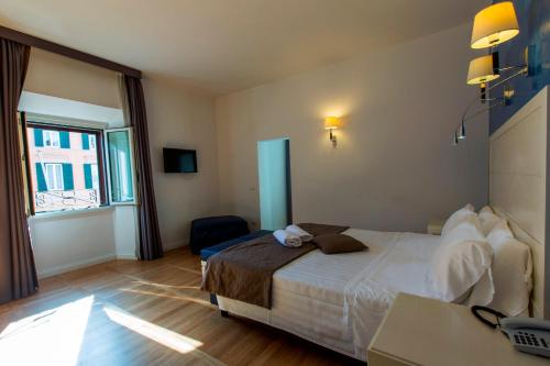 Habitación Cuádruple Deluxe del hotel Floris. Foto 5
