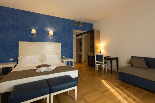 Habitación Cuádruple Deluxe del hotel Floris. Foto 7