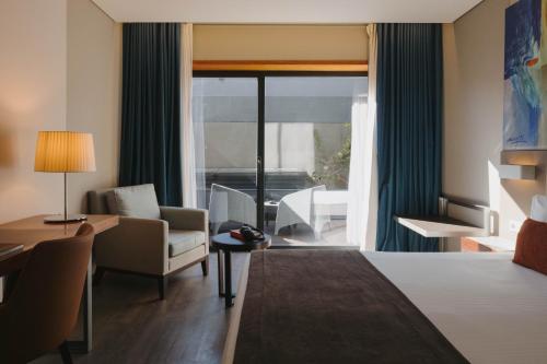 Habitación Doble Deluxe con balcón del hotel Timbre Heroismo. Foto 7