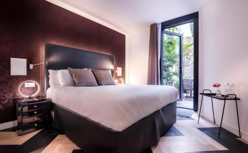 Habitación Doble Estándar del hotel Le Rayz Vendôme. Foto 3