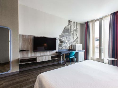 Habitación Clásica del hotel Mercure Firenze Centro. Foto 2