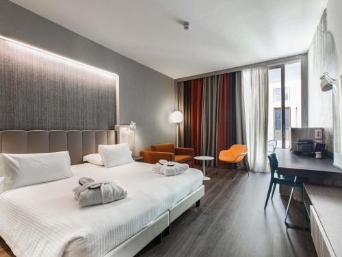 Habitación Privilege con balcón del hotel Mercure Firenze Centro