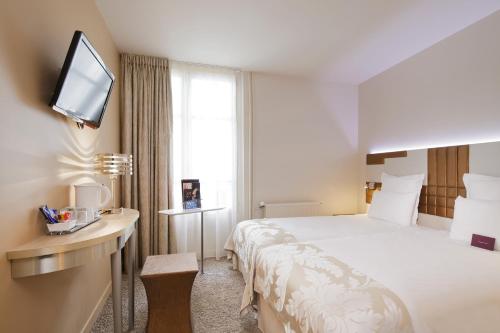 Habitación Doble Superior - 2 camas del hotel Mercure Paris Opéra Faubourg Montmartre. Foto 2