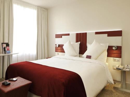 Habitación Doble Superior - 2 camas individuales del hotel Mercure Paris Opéra Faubourg Montmartre. Foto 1