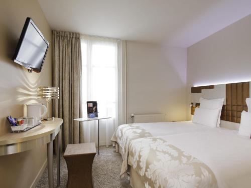Habitación Doble Superior - 2 camas del hotel Mercure Paris Opéra Faubourg Montmartre. Foto 6