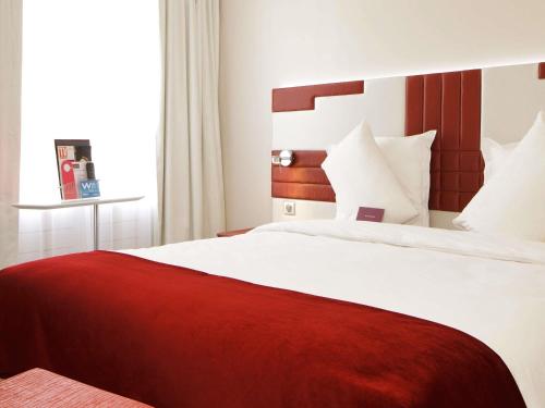 Habitación Doble Clásica del hotel Mercure Paris Opéra Faubourg Montmartre. Foto 1