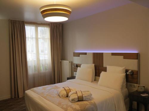 Habitación Privilege - 1 cama doble del hotel Mercure Paris Opéra Faubourg Montmartre. Foto 5
