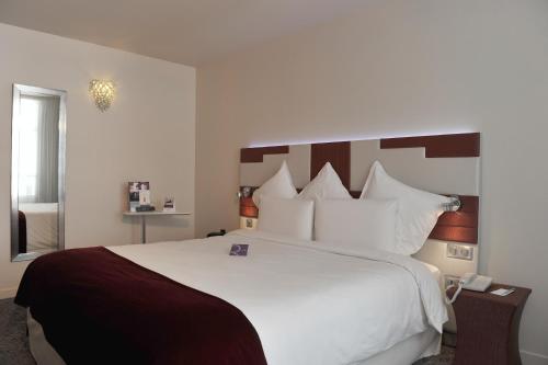 Habitación Doble Clásica del hotel Mercure Paris Opéra Faubourg Montmartre. Foto 5