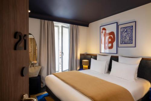 2 habitaciones comunicadas del hotel Cristal Champs-Elysées. Foto 1