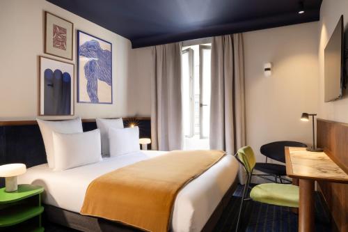 Habitación Deluxe del hotel Cristal Champs-Elysées. Foto 3