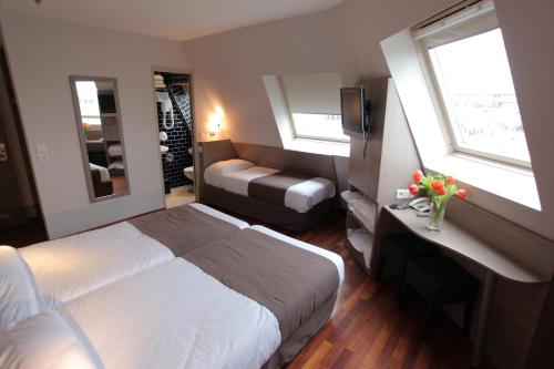 Habitación Triple del hotel Grand Du Loiret