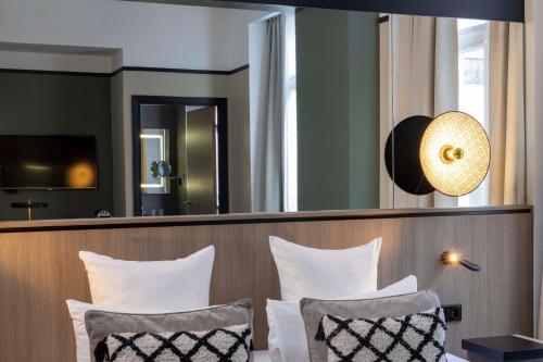 Habitación Executive del hotel Opéra Liège. Foto 3