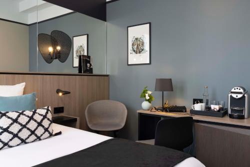 Habitación Executive del hotel Opéra Liège. Foto 4