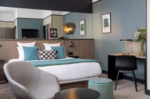 Habitación Executive del hotel Opéra Liège. Foto 8